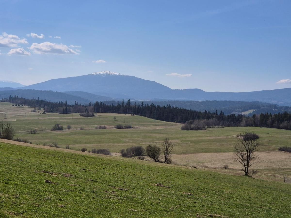 Pola i góry na horyzoncie